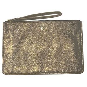 Lululemon Athletica Bags | Lululemon Goody Bag Metallic Gold Wristlet